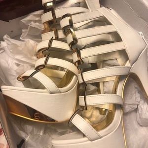 Liliana size 7 white gladiator heels .